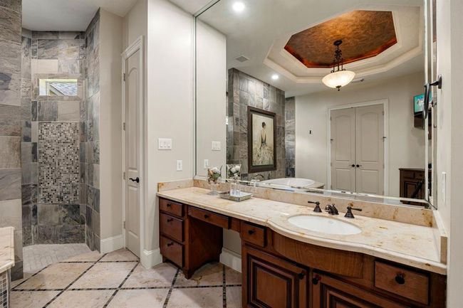 Plenty of counter space along with storage. | Image 22