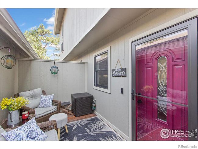 The sitting area in the front of the home is a nice place to wind down at the end of the day. | Image 32