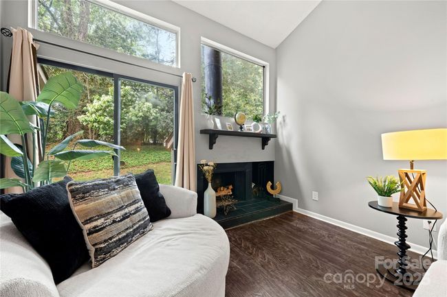 living room with fireplace | Image 17