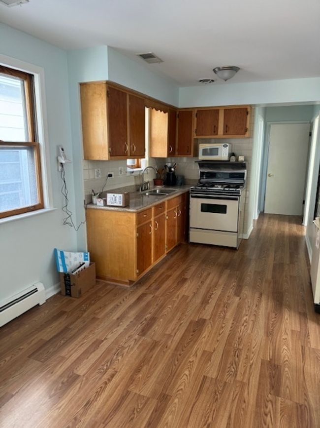 913 N 24 Th Ave, Home with 5 bedrooms, 2 bathrooms and 6 parking in Melrose Park IL | Image 4