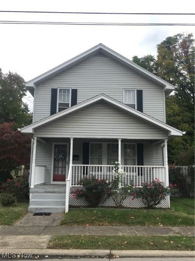 View of front of home with a porch | Image 1