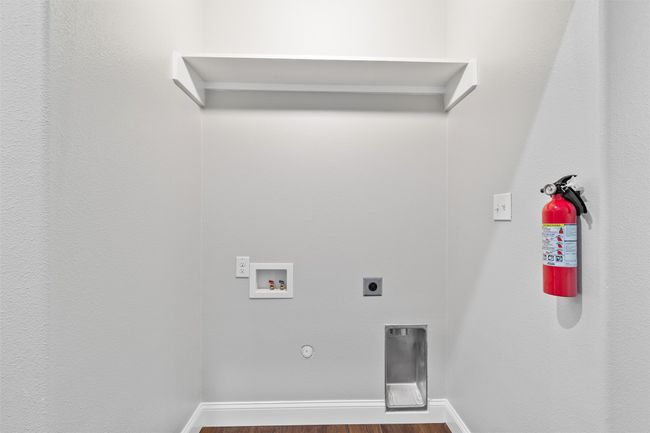 Laundry area with gas dryer hookup, hookup for an electric dryer, and hookup for a washing machine | Image 12