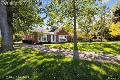 24099 W River Road, Home with 3 bedrooms, 2 bathrooms and null parking in Grosse Ile Twp MI | Image 1