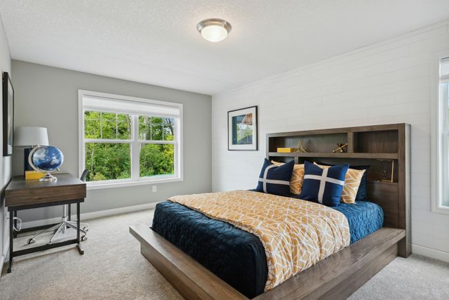 (Photo of decorated model, similar floor plan, colors, finishes and features will vary) The second generously sized upper level secondary bedroom with a spacious closet. This is the other bedroom attached to the dual entry bath. | Image 17