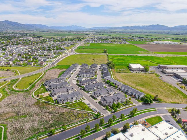 Aerial perspective of suburban area featuring a mountainous background | Image 28