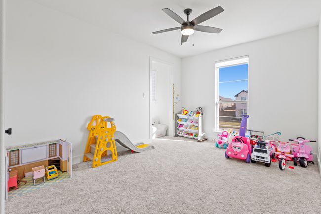 Game room with carpet and ceiling fan | Image 27