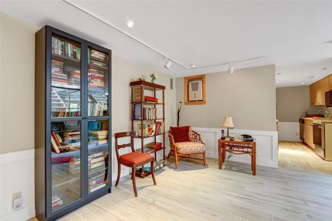 Sitting room with visible vents, rail lighting, and light wood-type flooring | Image 29