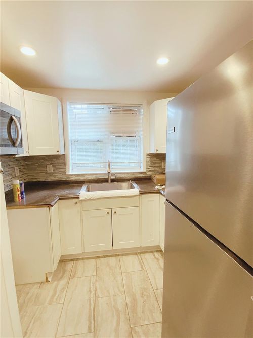 1-1613 Tomlinson Ave, Bronx, NY, 10461-1528 | Card Image