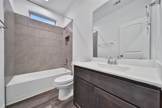 The guest bath is one you'll be proud to say "first door on the right". | Image 30