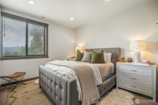 2nd upstairs bedroom enjoys a view and private access to the hall bathroom | Image 15