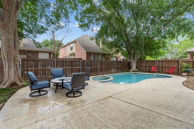 Plenty of space around the pool for lounging. | Image 17
