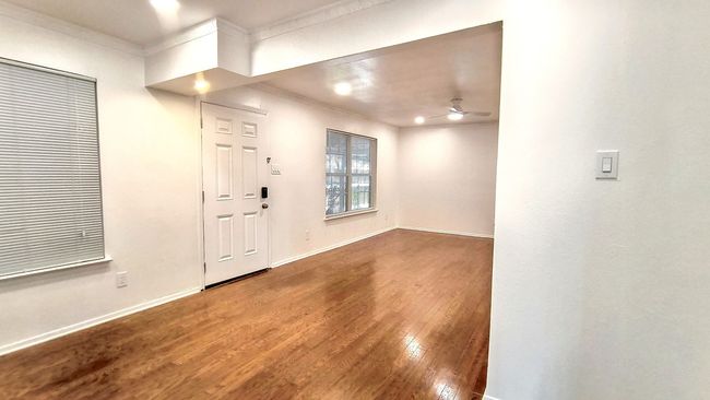Foyer entrance with ceiling fan, ornamental molding, and hardwood / wood-style floors | Image 18