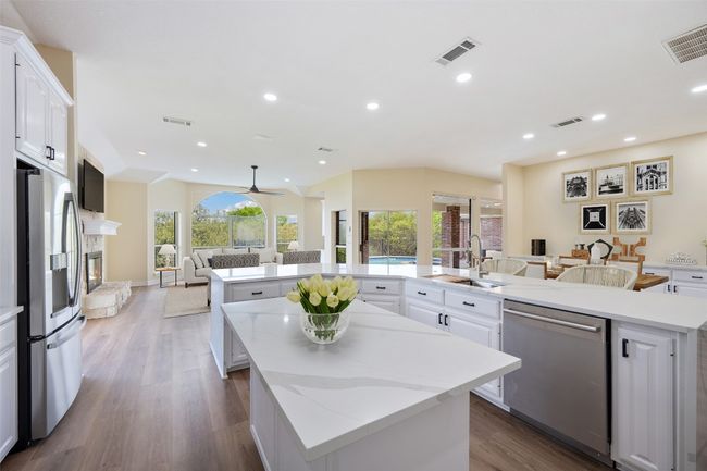 Beautiful kitchen with gleaming countertop | Image 12