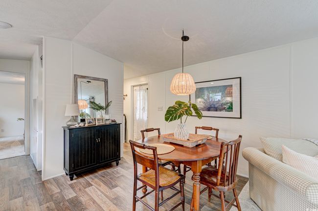 Dining room featuring light wood-type flooring | Image 9