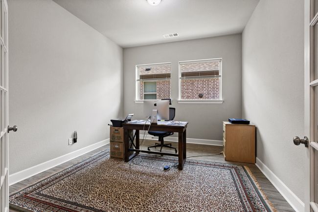 Right off the entry way, is the office | Image 9