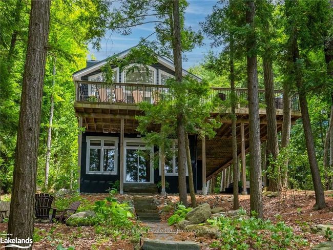 Nestled in the trees this cottage has maximum privacy | Image 6