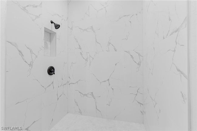 Interior details with tiled shower | Image 44