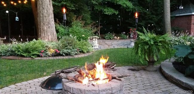 Backyard built in fire pit. | Image 25