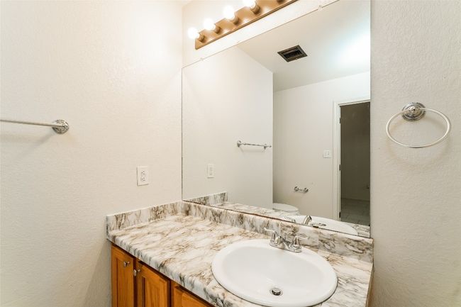 Bathroom featuring vanity | Image 19