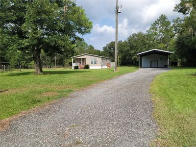 11241 Sw 106 Th Avenue, House other with 3 bedrooms, 2 bathrooms and null parking in Hampton FL | Image 1