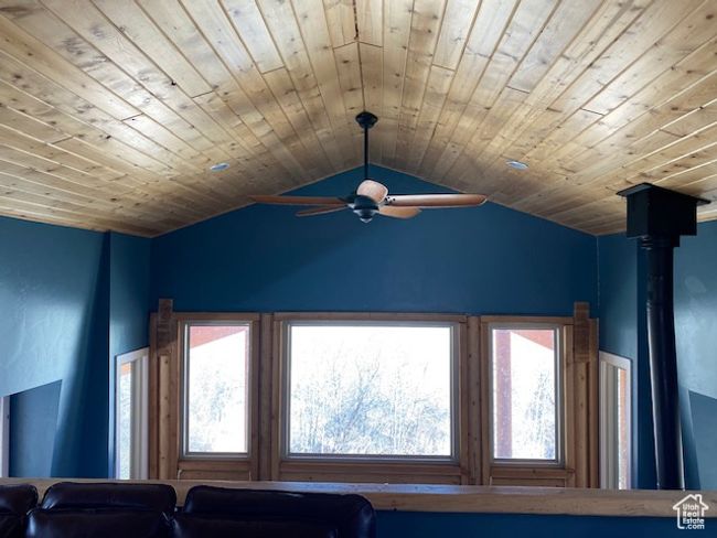 Detailed view of a ceiling fan and wooden ceiling | Image 11