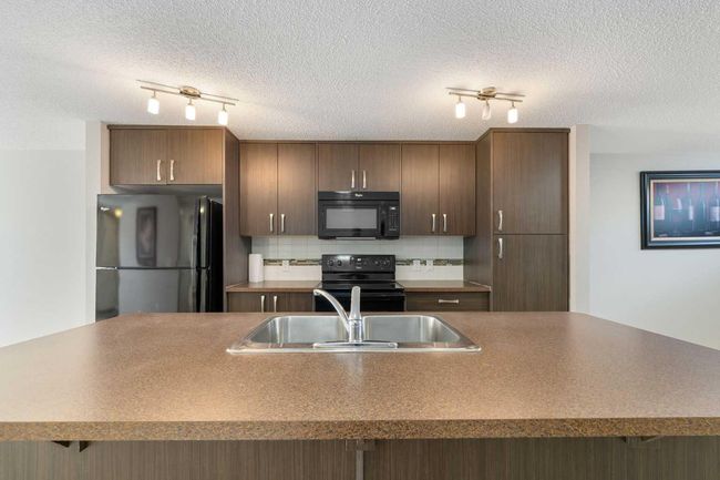 1417 Auburn Bay Cir Se, Townhouse with 2 bedrooms, 2 bathrooms and 1 parking in Calgary AB | Image 7