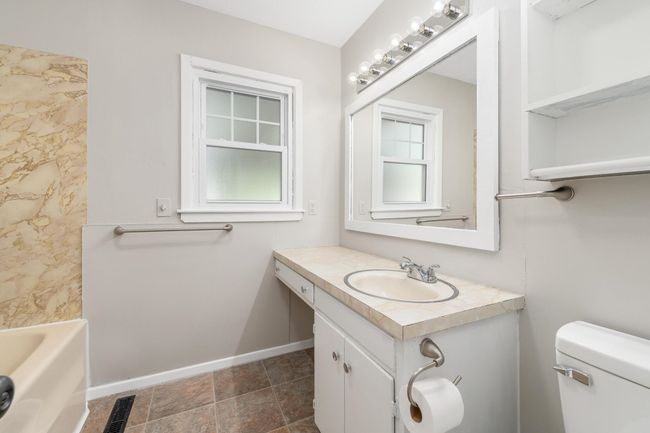 Bathroom with vanity and baseboards | Image 21