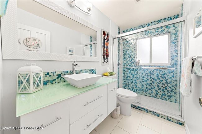Beautiful bathroom with walk in shower | Image 39