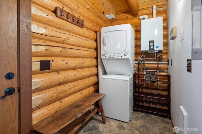Downstairs utility room and on demand hot water tank. | Image 21