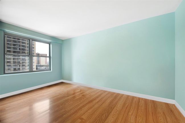 Unfurnished room with hardwood / wood-style flooring | Image 7