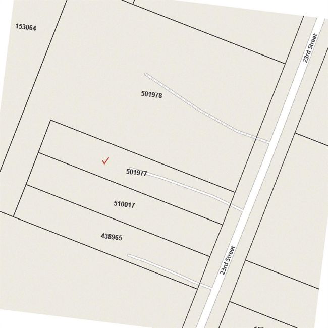 This is a property map showing several parcels of land along 23rd Street, each labeled with a unique number. The highlighted lot, marked with a check, is labeled 501977. | Image 5