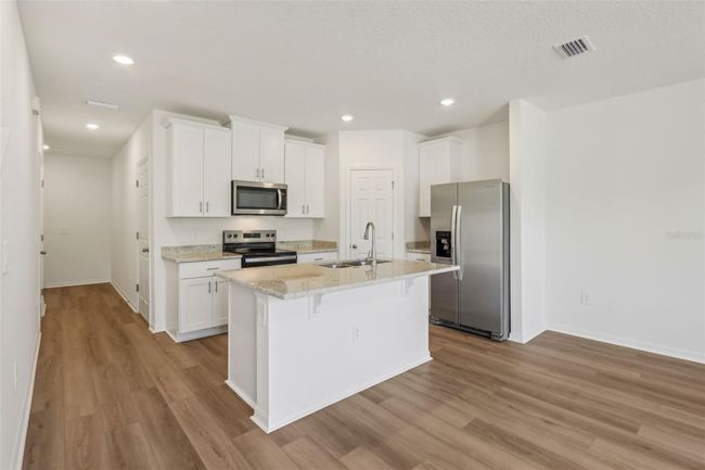 16419 Bird Of Paradise Ave, Townhouse with 3 bedrooms, 3 bathrooms and null parking in CLERMONT FL | Image 7