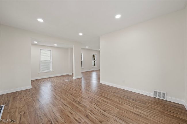 Empty room featuring light hardwood / wood-style flooring | Image 6