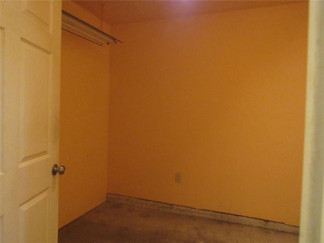 View of walk in closet | Image 11