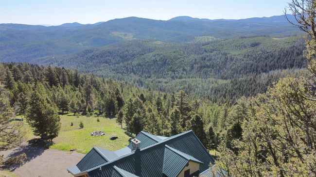 Mountain view with a heavily wooded area | Image 78
