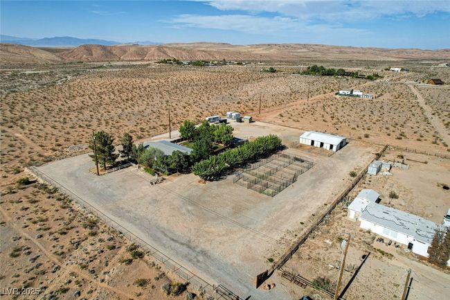 Overview of rural landscape featuring a desert landscape and a mountainous background | Image 57