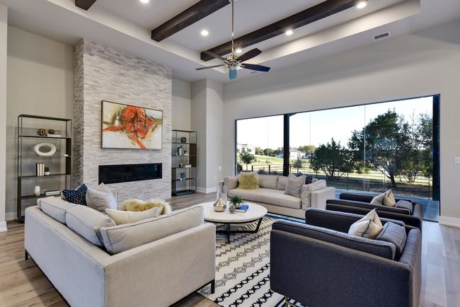 Relax in the great room with high ceilings and natural light | Image 9