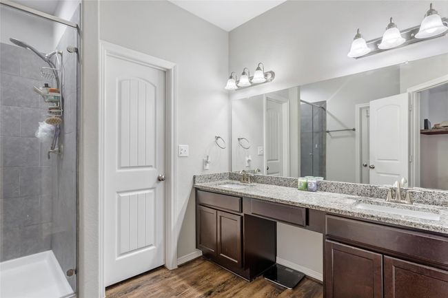 The primary bathroom has a very large walk in closet and separate linen closet. | Image 25