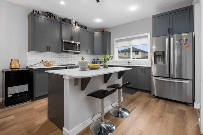 406 Hillcrest Road Sw, Home with 3 bedrooms, 3 bathrooms and 3 parking in Airdrie AB | Image 8