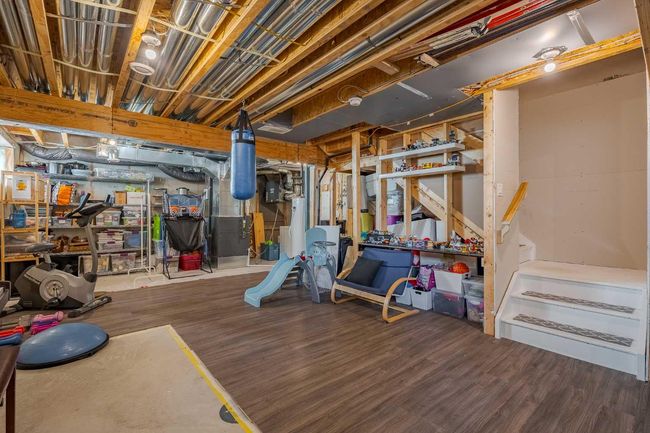 113 Palomino St, House other with 5 bedrooms, 4 bathrooms and 3 parking in Cochrane AB | Image 33