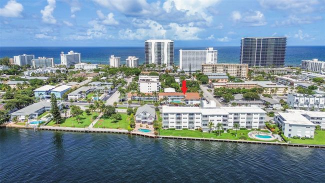 Discover Sun Set Apts. Co-op #27, a Turnkey, Move-In-Ready, Fully Furnished 2BR/1BA in Pompano Beach, Florida. This Second Floor Poolside Retreat Boasts Impact Windows & Doors, Retractable Screen Door, Three Friedrich A/C units (One with Heat, 2023 &​​‌​​​​‌​​‌‌​‌‌​​​‌‌​​‌‌​‌​​​​​‌ 2024). | Image 10
