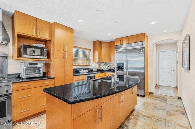 561 Capri Rd, House other with 4 bedrooms, 4 bathrooms and null parking in Cocoa Beach FL | Image 31