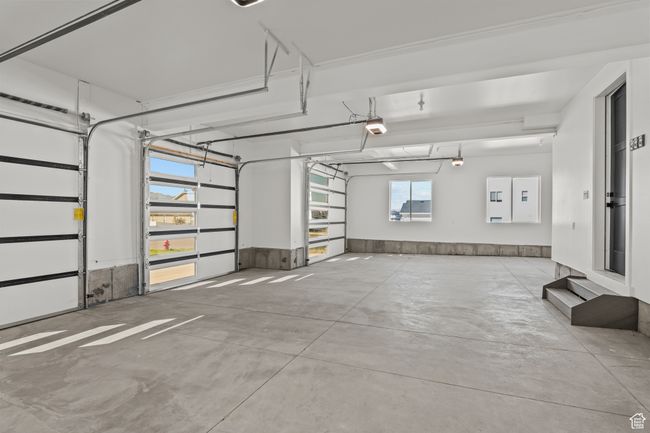 Garage with a garage door opener | Image 62