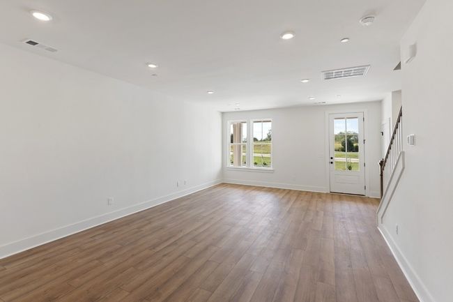 Lots of space means lots of options and flexibility for furniture placement! And we hope you enjoy natural light, because there are oversized windows everywhere! Actual photo of home. | Image 5
