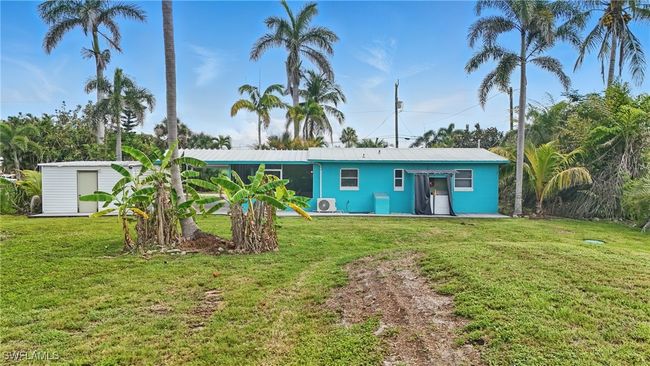 View of front of home with a front yard and stucco siding | Image 34