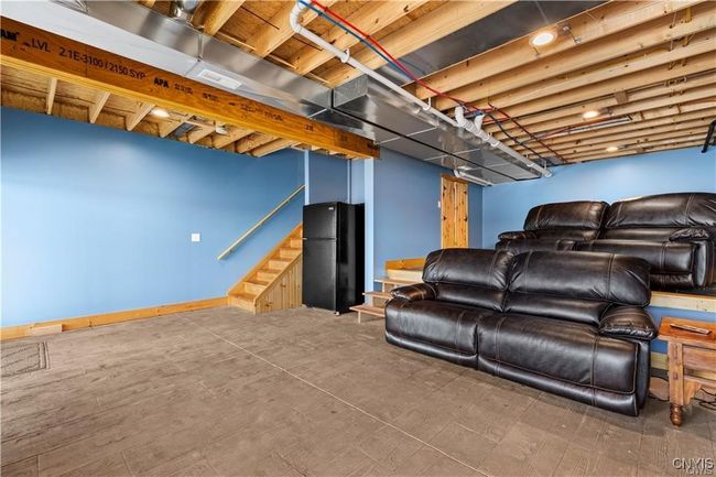 Lower level with theatre room | Image 24