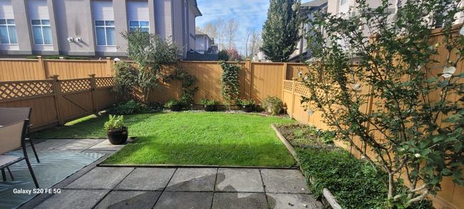 View of yard with a patio and a fenced backyard | Image 25