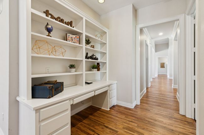 Another home office hub is this built-in unit just off the kitchen. Perfect for homework or taking care of the business of running a household. | Image 19