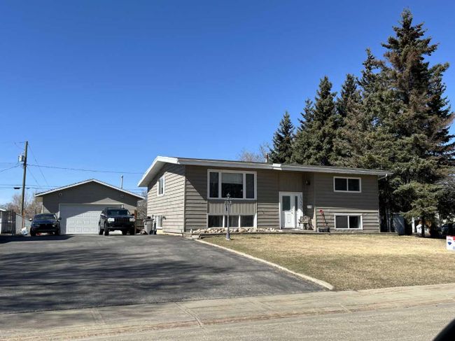 10918 97 Street, Home with 3 bedrooms, 1 bathrooms and 4 parking in Grande Prairie AB | Image 1