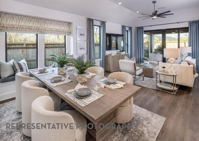 Dining room featuring dark wood-style floors, ceiling fan, recessed lighting, and vaulted ceiling | Image 13